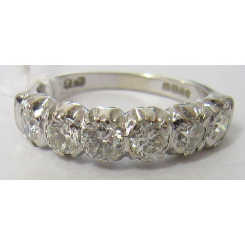 289 - A SIX STONE DIAMOND HALF HOOP RING, the brilliant cut stones point set to a plain 18ct gold shank, L... 