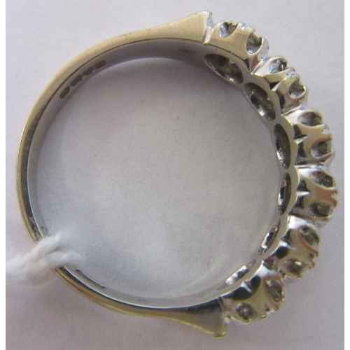 289 - A SIX STONE DIAMOND HALF HOOP RING, the brilliant cut stones point set to a plain 18ct gold shank, L... 