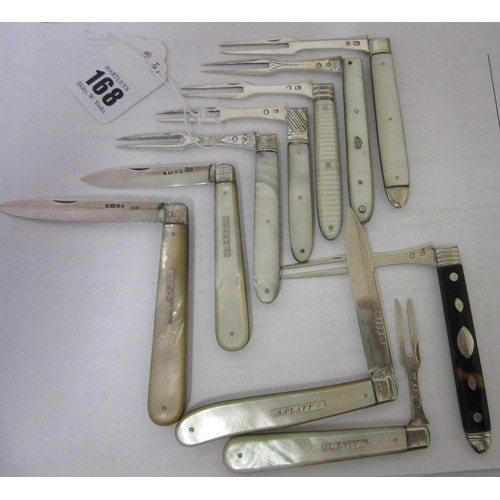 168 - A VICTORIAN SILVER FOLDING FRUIT KNIFE AND FORK by George Unite, Sheffield 1877, the mother-of-pearl... 