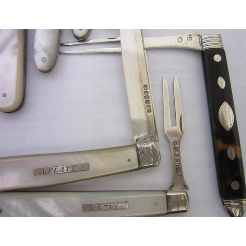 168 - A VICTORIAN SILVER FOLDING FRUIT KNIFE AND FORK by George Unite, Sheffield 1877, the mother-of-pearl... 