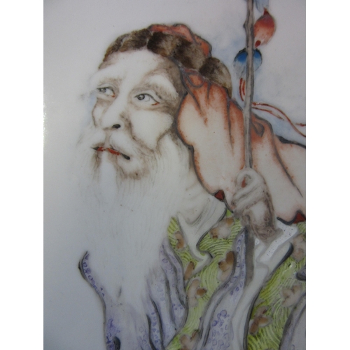 4 - A CHINESE PORCELAIN OBLONG PLAQUE, on glaze painted in pastel shades with a vignette of an aged trav... 