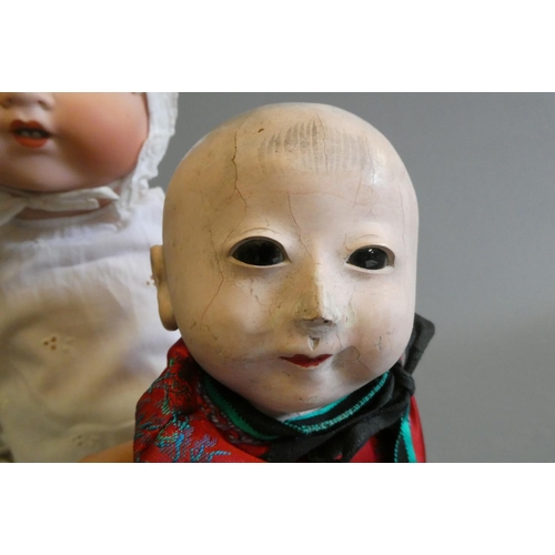 100 - Two vintage dolls, comprising an Armand Marseille bisque socket head doll with sleeping eyes, open m... 