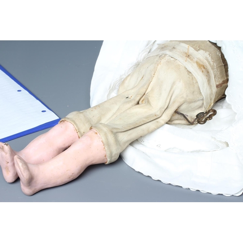 102 - A Jules Steiner bisque head automaton doll, with blue glass fixed eyes, open mouth, teeth, pierced e... 