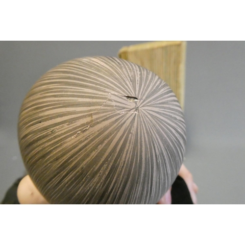 105 - A Japanese doll, with composition head, glass fixed eyes, composition lower limbs, original outfit a... 