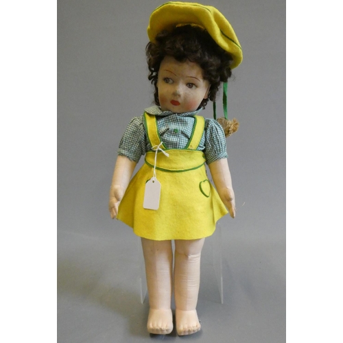 106 - Chad Valley girl doll, of fabric construction, with sideways glancing painted eyes, shirt, felt dres... 