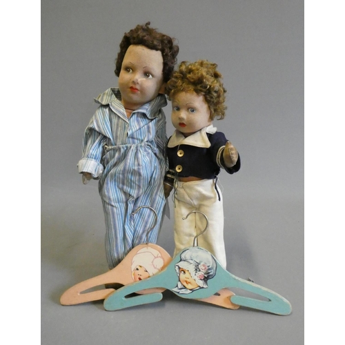107 - Two Farnell's Alpha Toys dolls, both of felt construction, with painted features, sideways glancing ... 