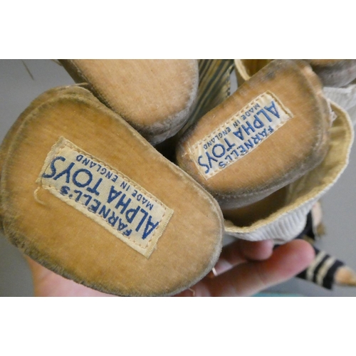 107 - Two Farnell's Alpha Toys dolls, both of felt construction, with painted features, sideways glancing ... 