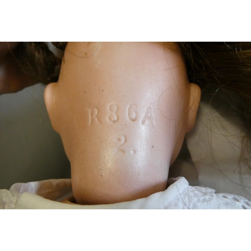 108 - Three German bisque head dolls, comprising a 15