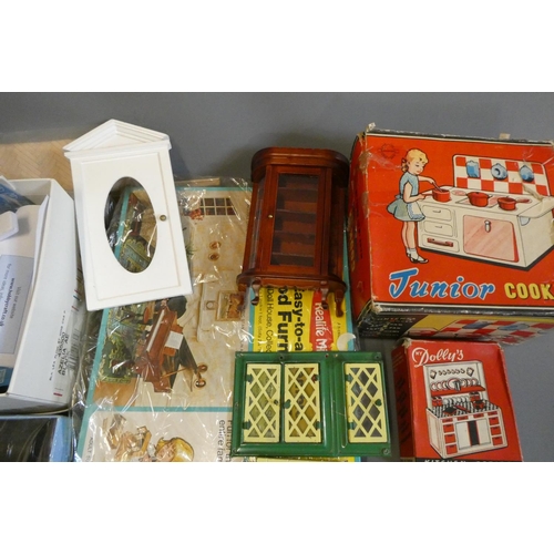 111 - Doll's house furniture and accessories, including wood and metal fixtures, boxed light fittings, kit... 