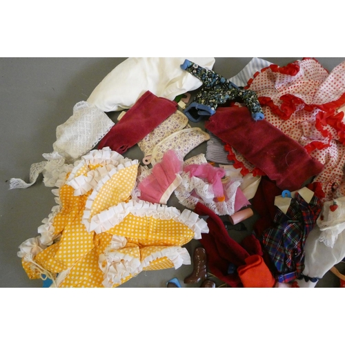 112 - Four Sindy dolls and a collection of Sindy associated clothing and accessories (qty)
