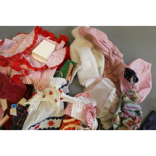 112 - Four Sindy dolls and a collection of Sindy associated clothing and accessories (qty)