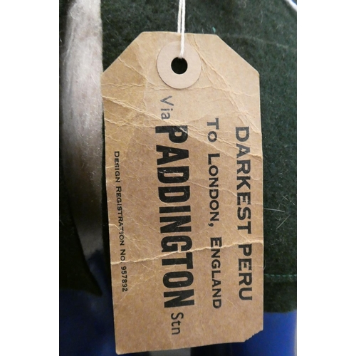 128 - Vintage Paddington bear, with orange felt hat, green felt coat, blue Dunlop boots and cardboard labe... 