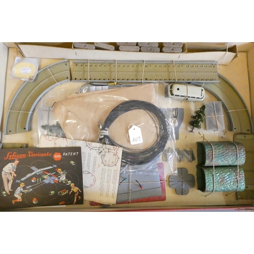 269 - Schuco Varianto 3010 Set with clockwork bus and track parts, box AF, models good