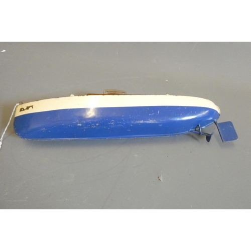 277 - Sutcliffe Boats clockwork Meteor speed boat, some minor paint damage and windscreen loose, clockwork... 