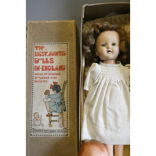 62 - Five vintage dolls, including two in original boxes (one by Lord Roberts Memorial Workshops), an AM ... 