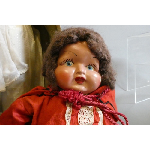 62 - Five vintage dolls, including two in original boxes (one by Lord Roberts Memorial Workshops), an AM ... 