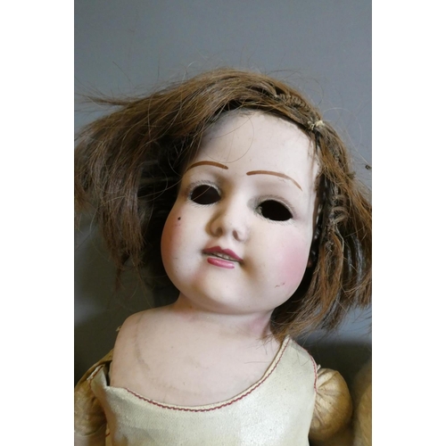 66 - Eight vintage and early 20th century dolls, including an AM 351 baby, a Heubach Koppelsdorf 300, thr... 