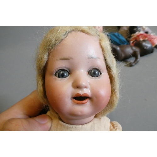 66 - Eight vintage and early 20th century dolls, including an AM 351 baby, a Heubach Koppelsdorf 300, thr... 