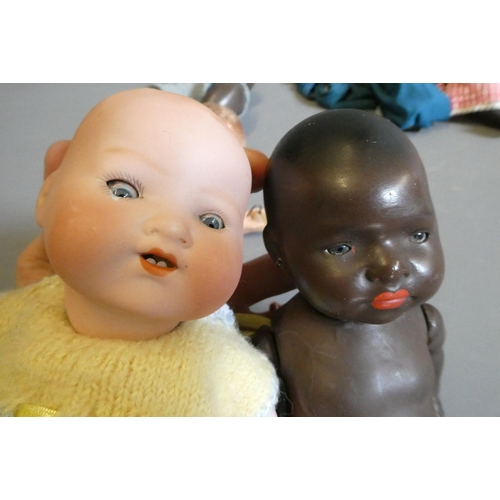 66 - Eight vintage and early 20th century dolls, including an AM 351 baby, a Heubach Koppelsdorf 300, thr... 