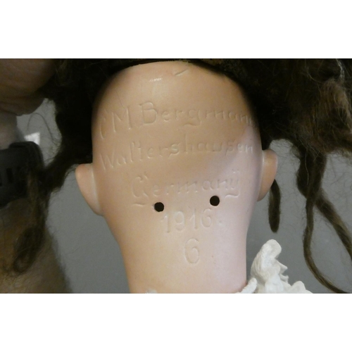 67 - A Bergmann Walterhausen bisque socket head doll, with blue glass sleeping eyes, open mouth, teeth, w... 