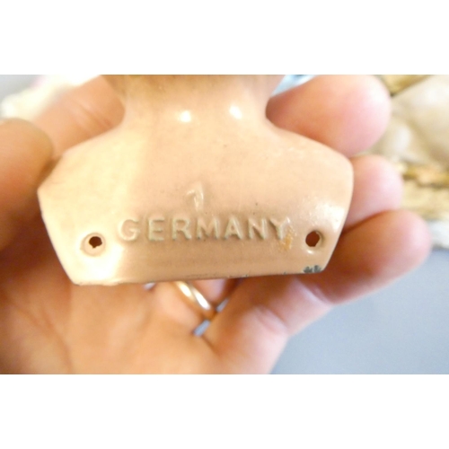 68 - Seven vintage dolls, comprising three all bisque doll's house dolls, including one with glass eyes, ... 