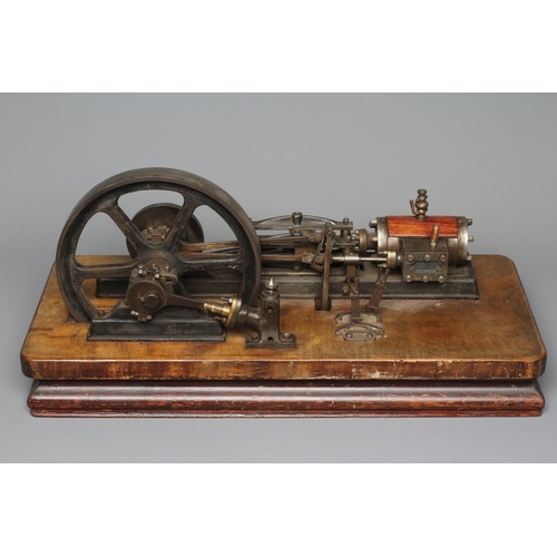 694 - A large horizontal stationary single cylinder mill engine, wood lagged cylinder with drain cocks dri... 