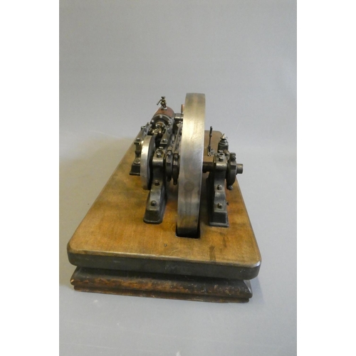 694 - A large horizontal stationary single cylinder mill engine, wood lagged cylinder with drain cocks dri... 