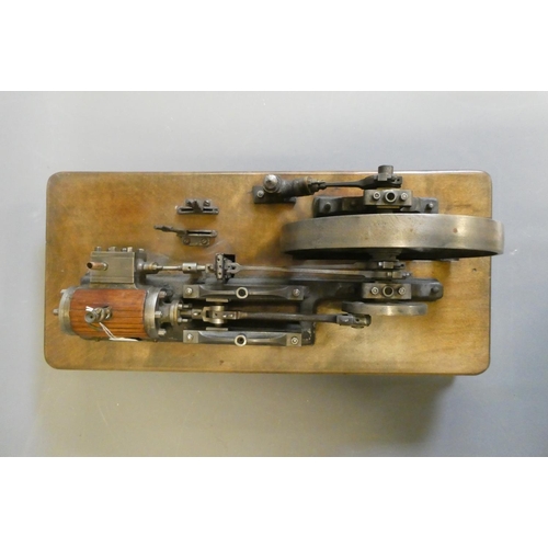 694 - A large horizontal stationary single cylinder mill engine, wood lagged cylinder with drain cocks dri... 