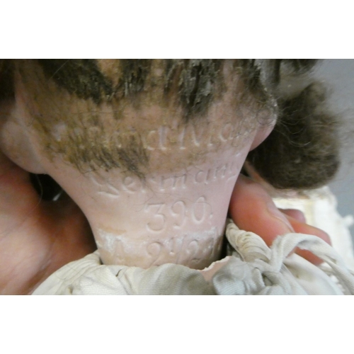 70 - Two German bisque socket head dolls, comprising a 21