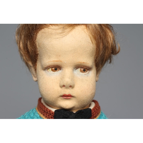 72 - An early Lenci boy doll, with sideways glancing eyes, felt body, original outfit, leather shoes, 16 ... 