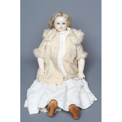 74 - A Victorian poured wax shoulder head doll, with blue glass fixed eyes, closed mouth, blond wig, fabr... 