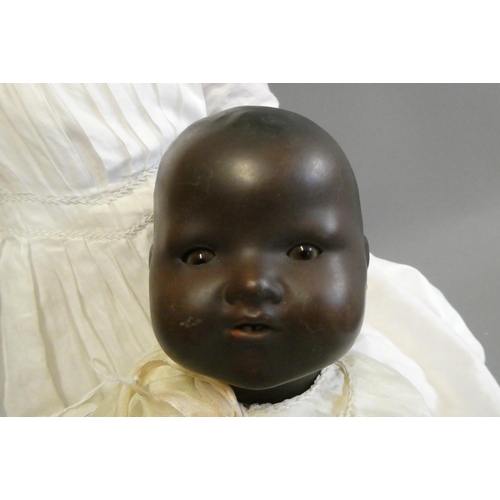 77 - A Heubach Koppelsdorf bisque socket head character doll, with brown glass sleeping eyes, open mouth,... 