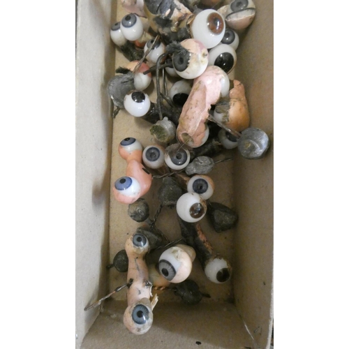 78 - Twenty five pairs of doll's eyes on rockers, and other assorted eyes