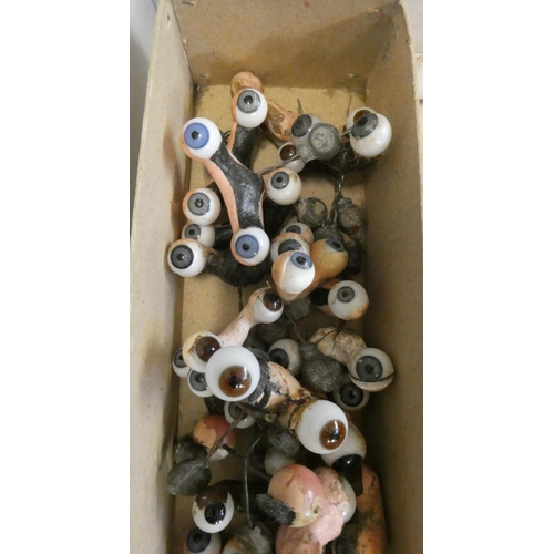 78 - Twenty five pairs of doll's eyes on rockers, and other assorted eyes