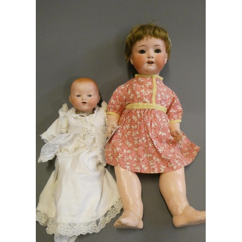 79 - A Heubach Koppelsdorf bisque socket head doll, with blue glass sleeping eyes, open mouth, teeth and ... 