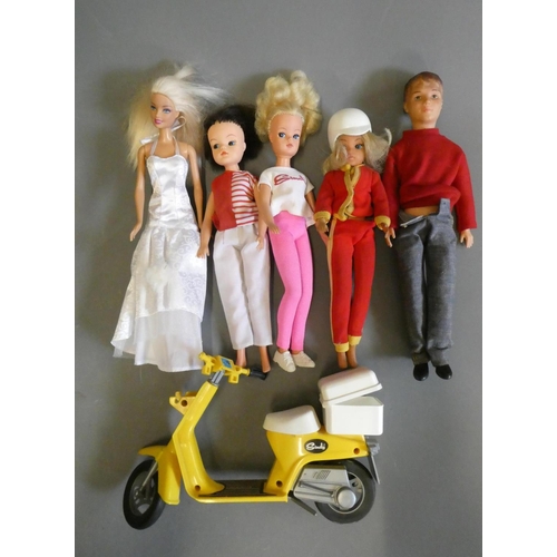 85 - Vintage dolls comprising three Sindy dolls (one with scooter), a Pedigree Sindy Paul doll, and a Bar... 