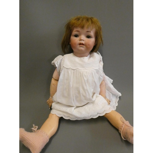 88 - A Simon & Halbig K & R bisque socket head doll, with brown glass sleeping eyes, open mouth, applied ... 