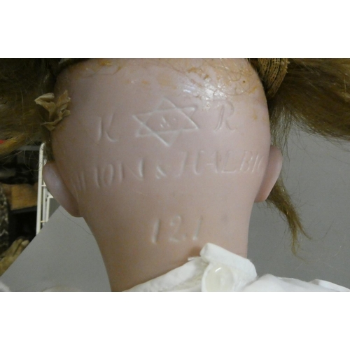 88 - A Simon & Halbig K & R bisque socket head doll, with brown glass sleeping eyes, open mouth, applied ... 