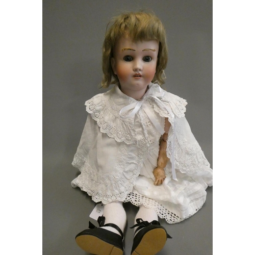 89 - A Heinrich Handwerck Simon & Halbig bisque socket head doll, with blue glass eyes, open mouth, teeth... 