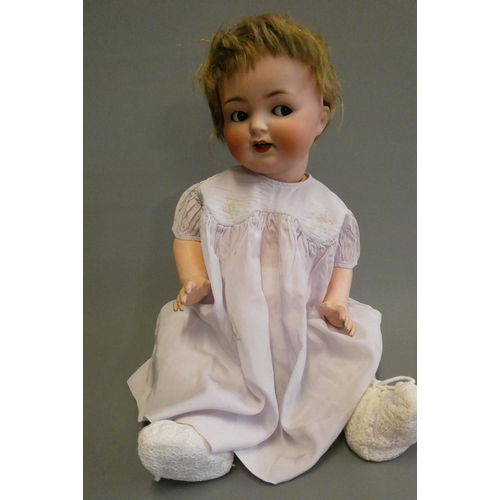 91 - A Heubach Koppelsdorf bisque socket head flirty doll, with brown glass side-ways glancing eyes, meta... 
