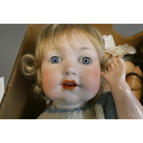 92 - Two Armand Marseille bisque socket head dolls, comprising a large 390 15 with blue glass sleeping ey... 