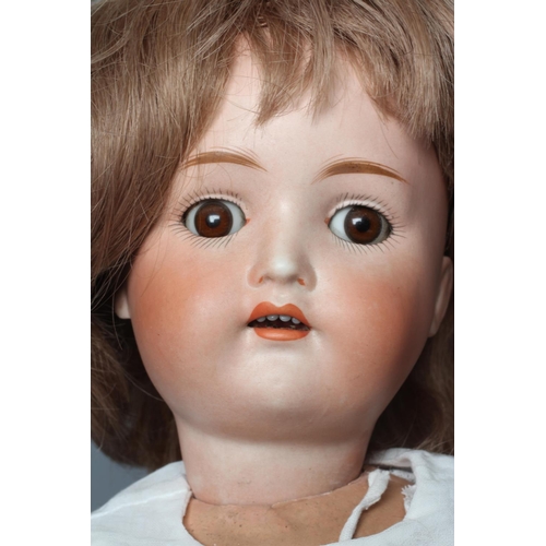 99 - A Kestner bisque socket head doll, with brown glass sleeping eyes, open mouth, applied teeth, wood a... 