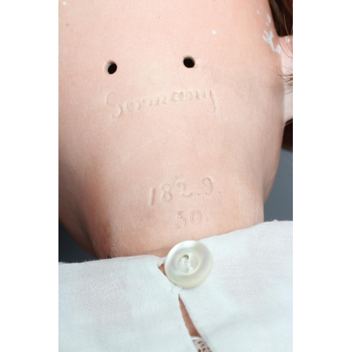 99 - A Kestner bisque socket head doll, with brown glass sleeping eyes, open mouth, applied teeth, wood a... 