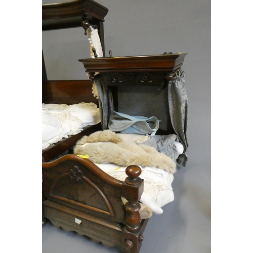 104 - Three antique doll's beds, all of wood construction, comprising two half testers and one with turned... 