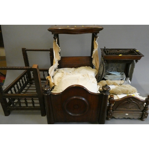 104 - Three antique doll's beds, all of wood construction, comprising two half testers and one with turned... 