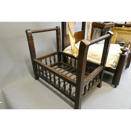 104 - Three antique doll's beds, all of wood construction, comprising two half testers and one with turned... 
