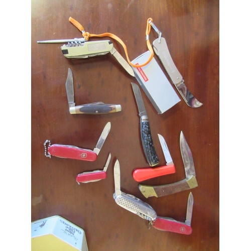 23 - TIN OF PENKNIVES