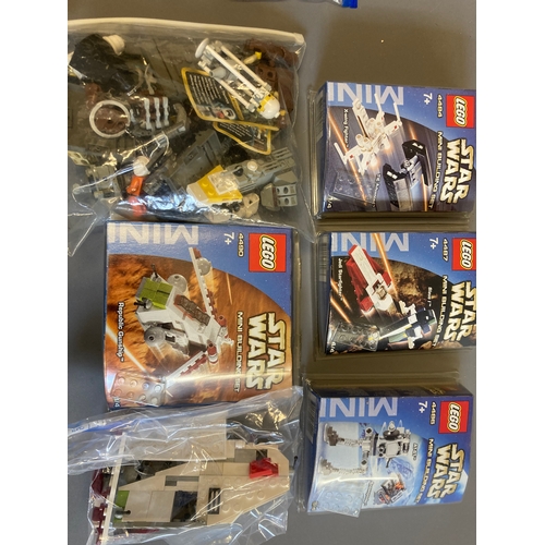 317 - A large quantity of Lego Star Wars figures and models. All recent issue items in plastic bags with f... 