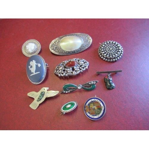 273 - TEN SILVER AND OTHER BROOCHES