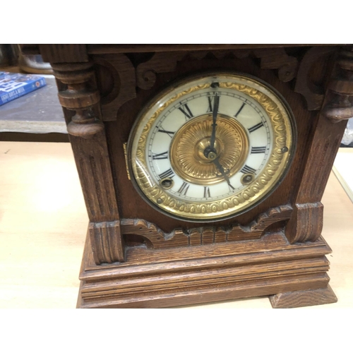 51 - mantle clock missing piece of wood from the back door